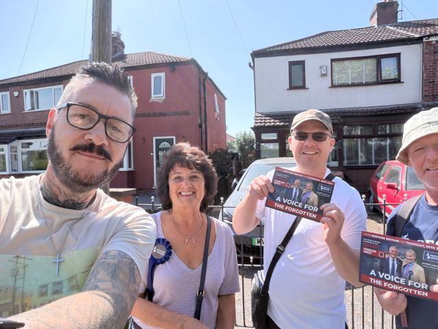 Volunteers delivering leaflets