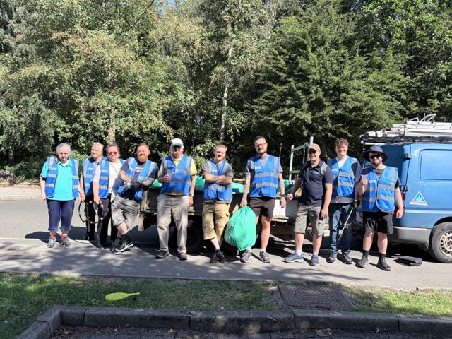 Members in hi-vis at a litter pick