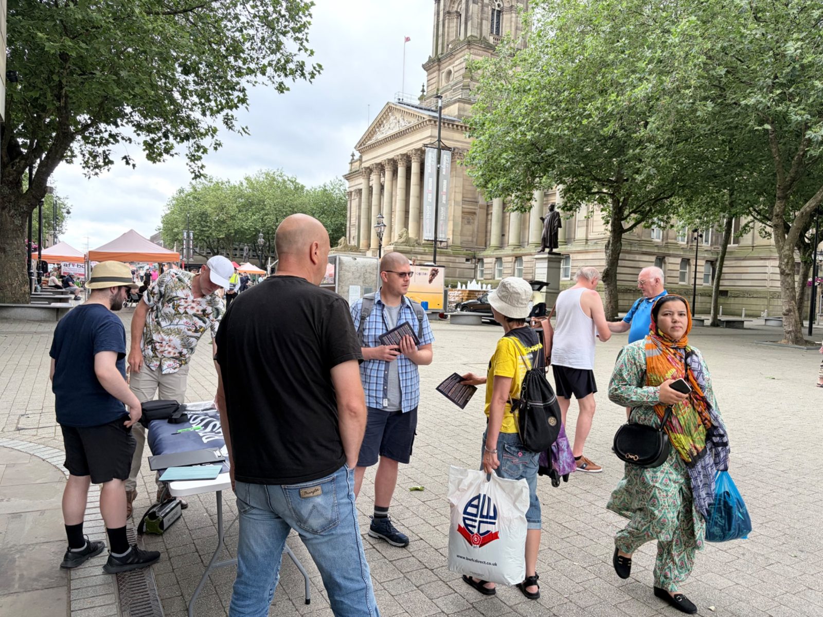 Members of the Bolton branch at a tabletop event outside Barclays in the town centre